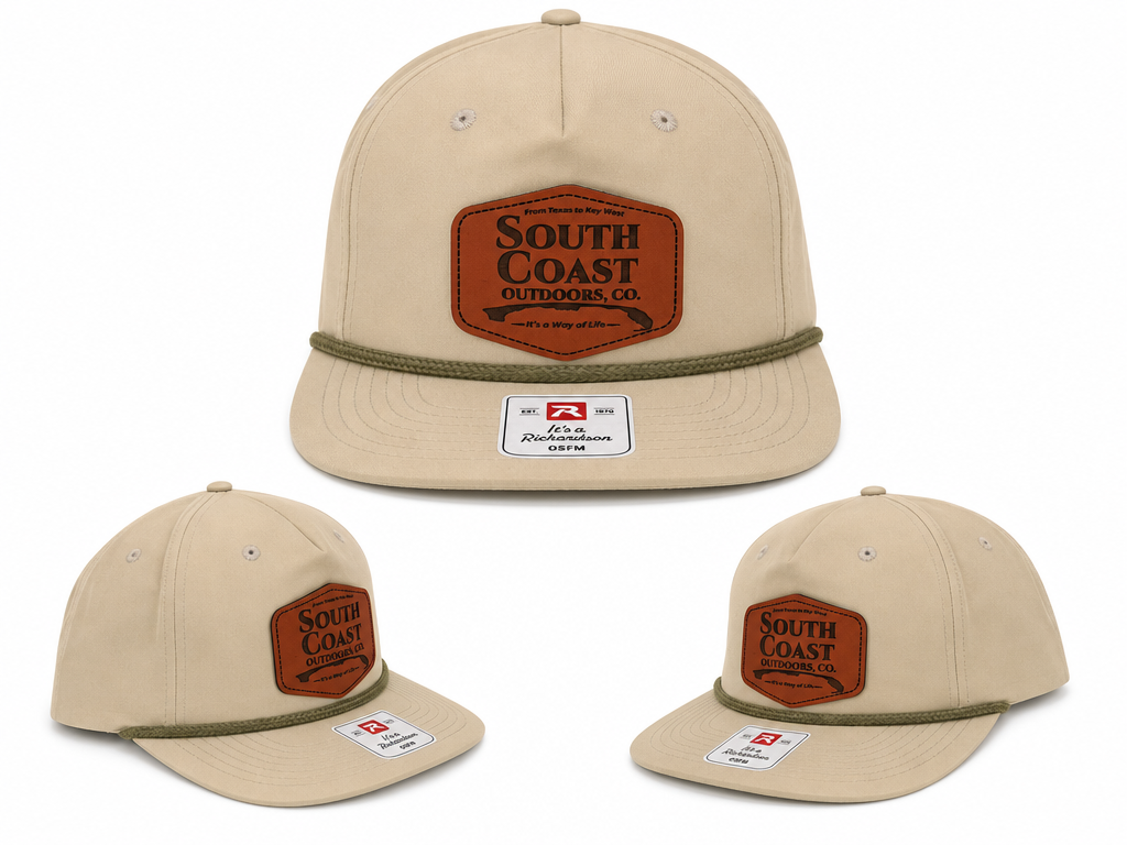 Beige gramps cap with South Coast Outdoors patch and green brim trim