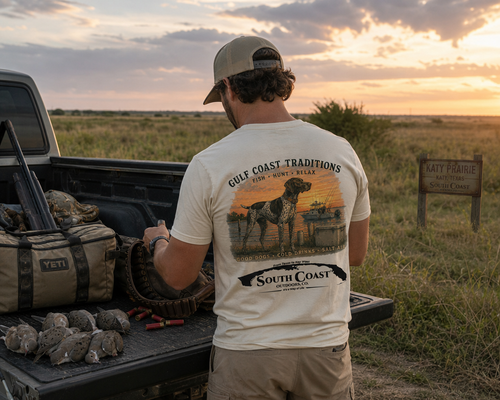 White graphic T-shirt back with Gulf Coast Traditions dog and sunset print