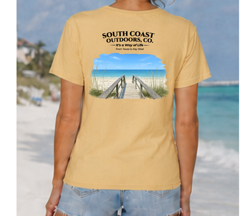 Light yellow short-sleeve T-shirt with beach boardwalk chest graphic