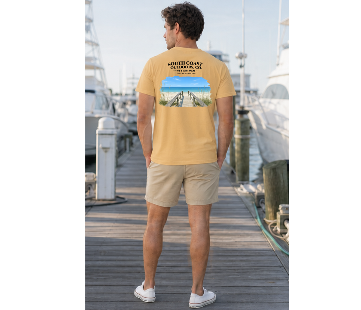 Light yellow short-sleeve T-shirt with back beach boardwalk graphic