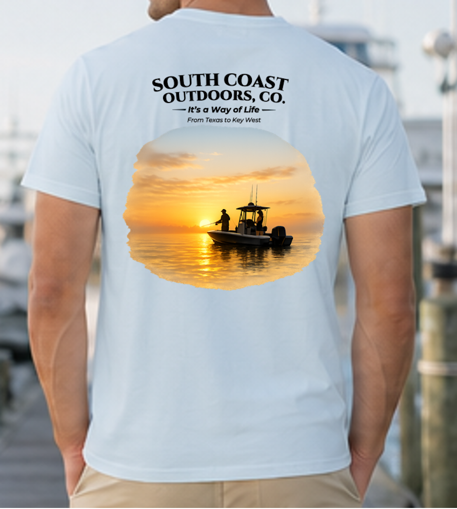 Men's sky blue fishing T-shirt, back graphic of sunset fishing boat at sea