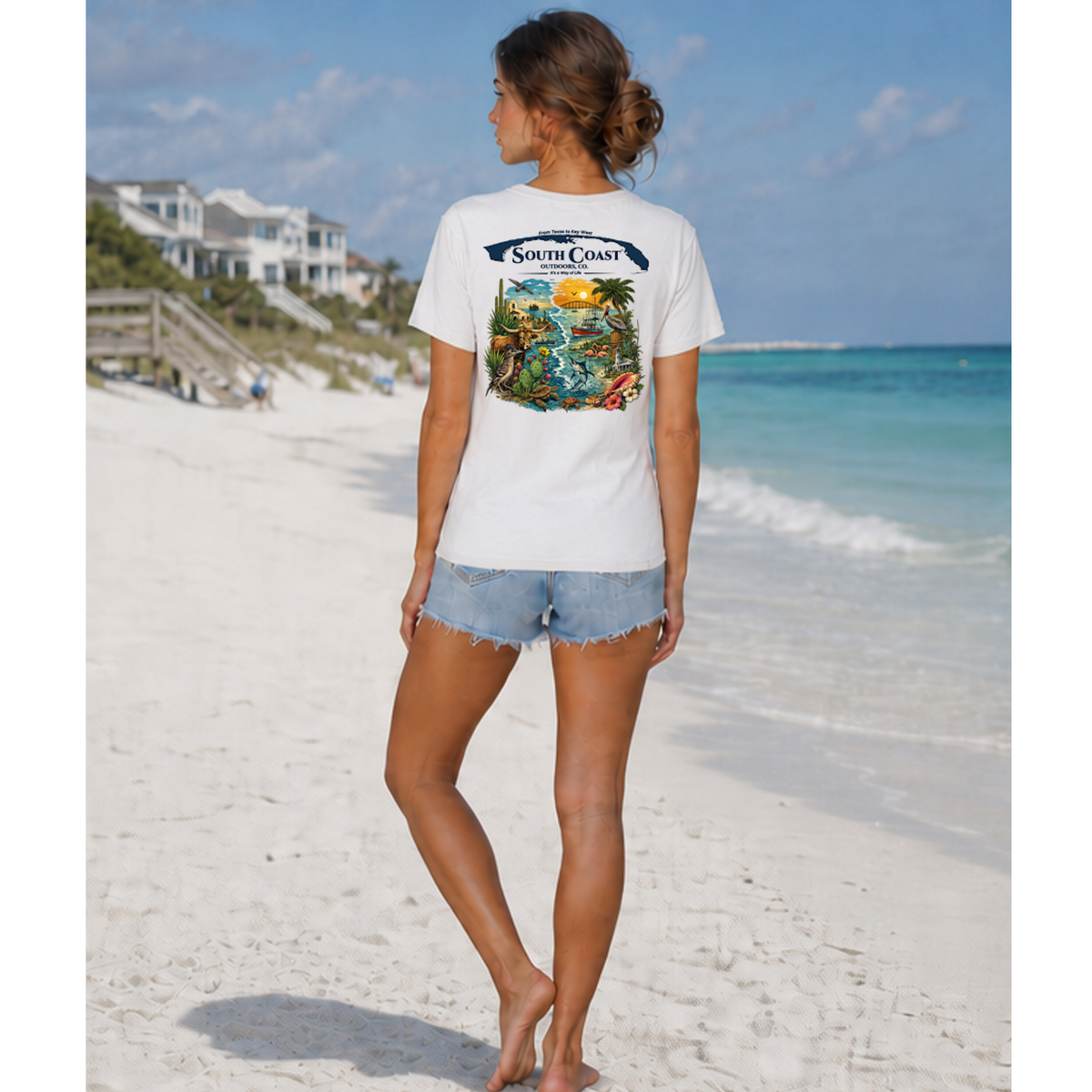 White T-shirt with back ocean wildlife graphic; worn with denim shorts