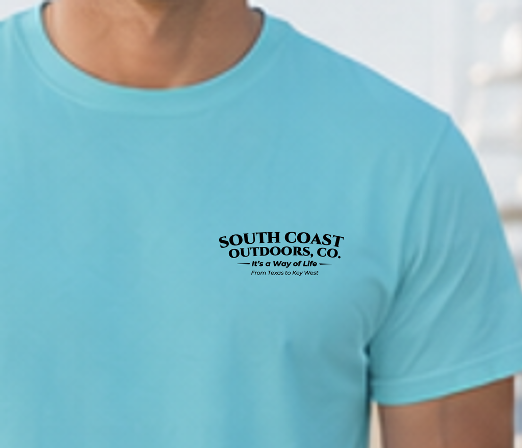 Light blue T-shirt with small chest logo text and fishing graphic