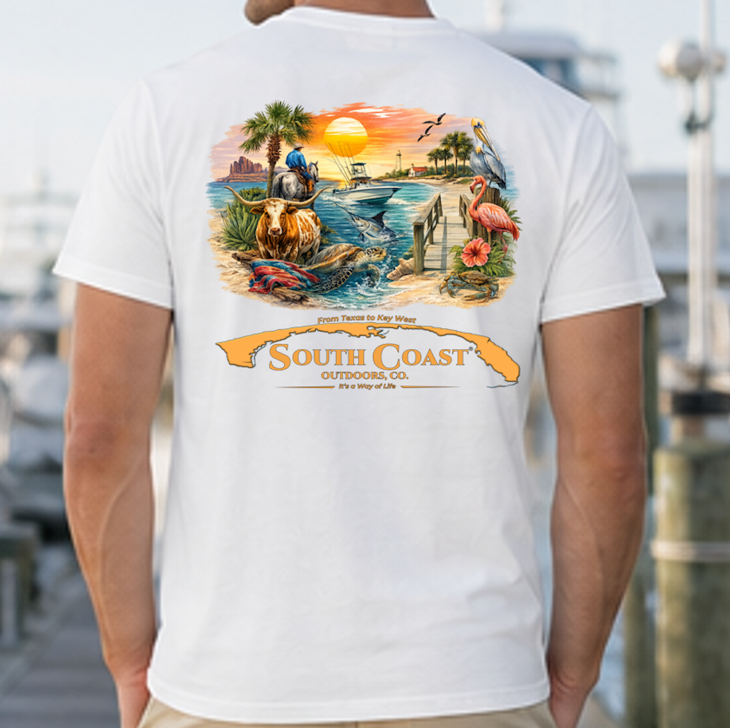 White graphic t-shirt with coastal animal scene and South Coast logo on back.