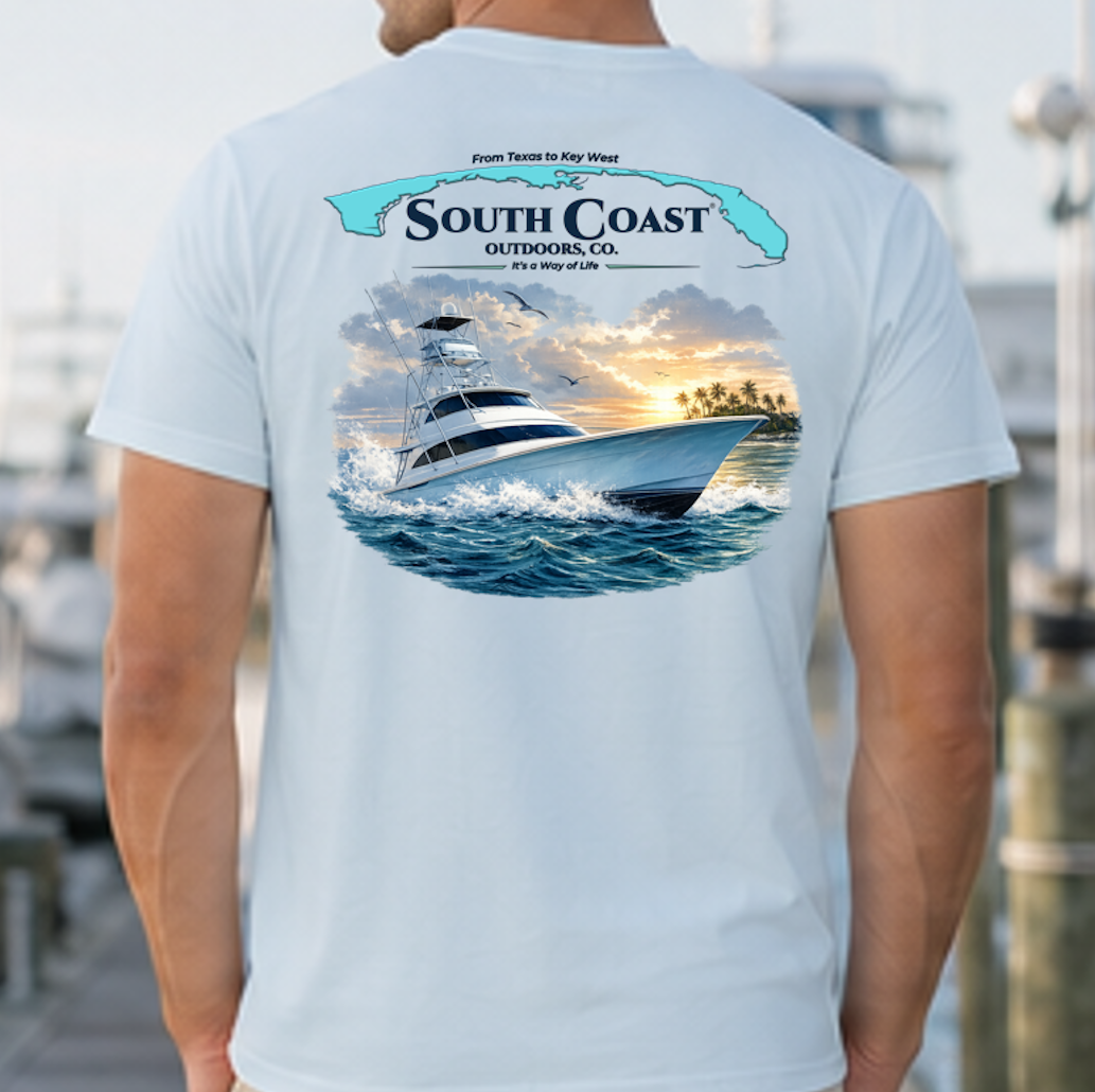 Light blue sport fishing T-shirt with back graphic of boat at sea