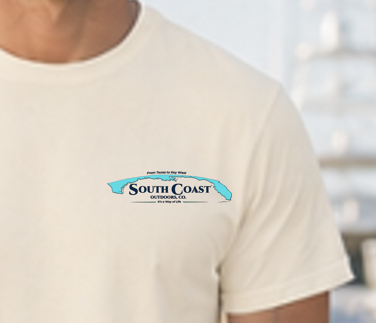 Cream T-shirt with small South Coast Outdoors Co. chest logo