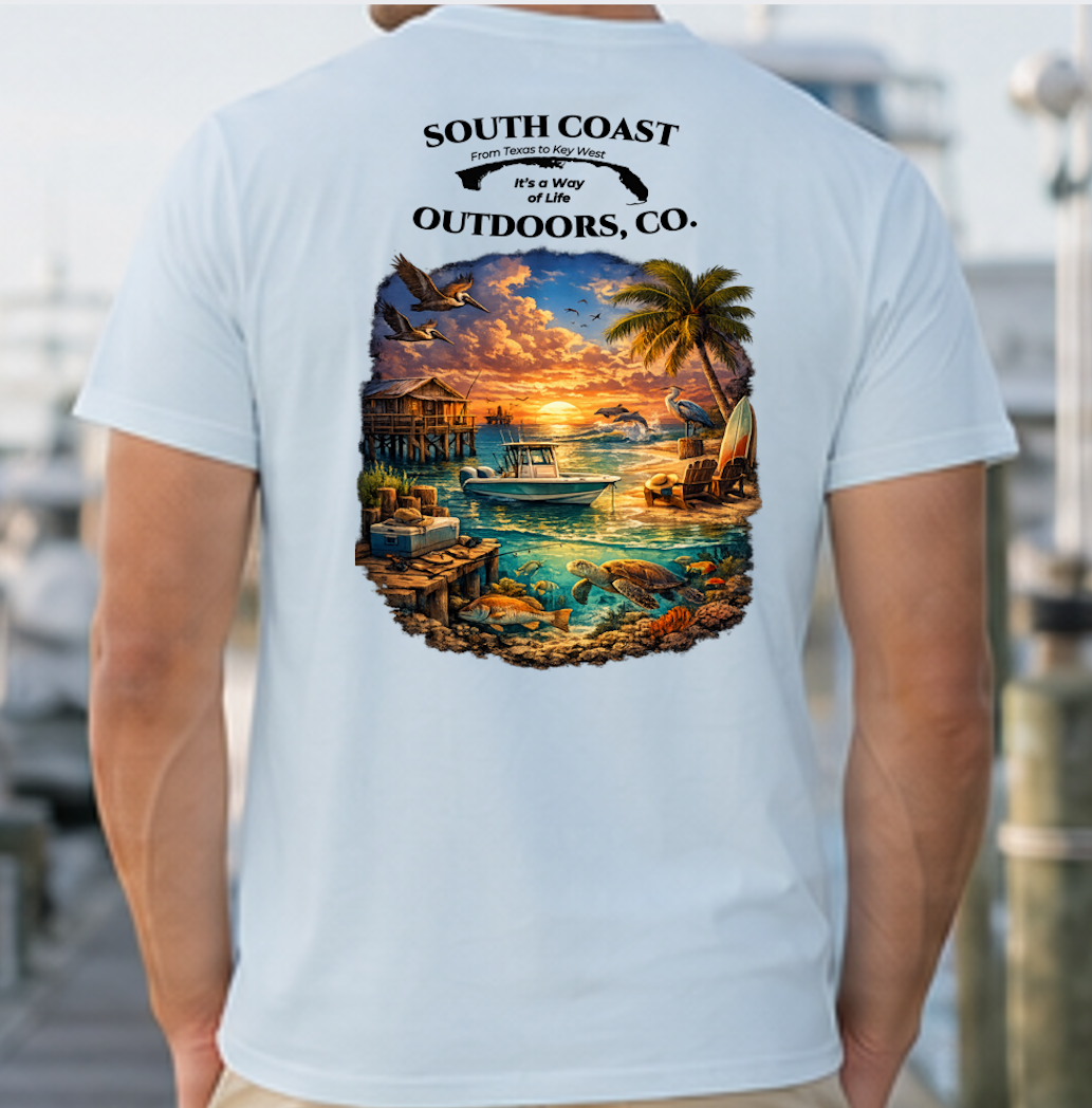 Powder blue graphic T-shirt with round sunset beach wildlife print on back