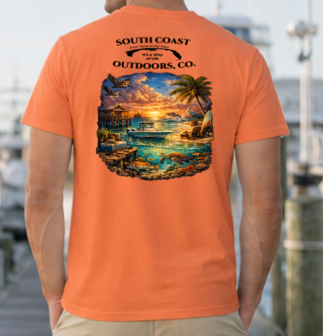 Burnt orange graphic T-shirt with round sunset beach wildlife print on back