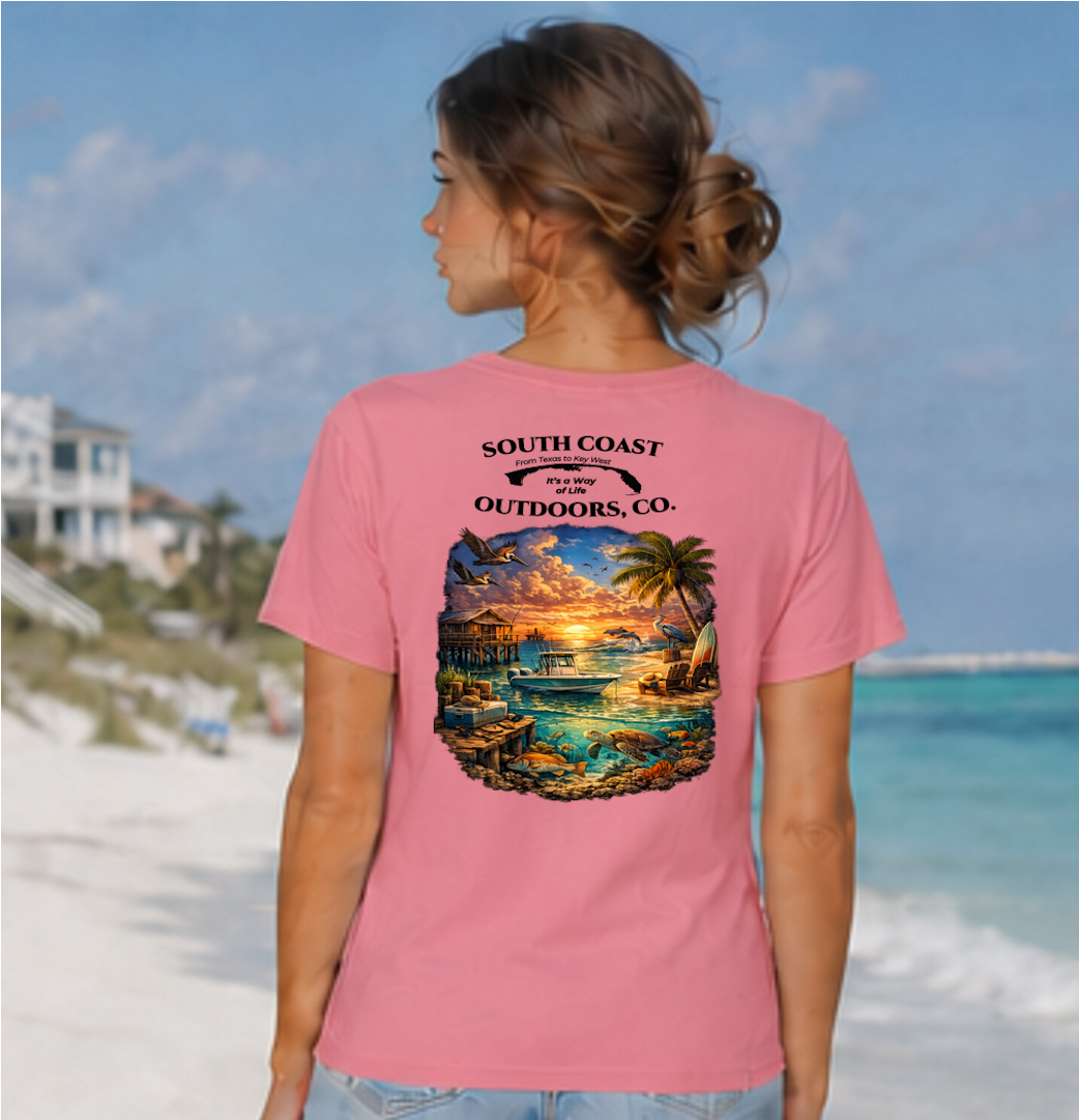 Pink graphic T-shirt with round sunset beach wildlife print on back