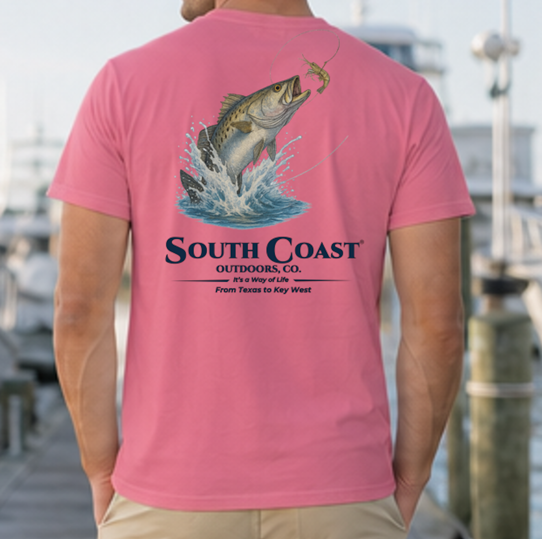 Pink back graphic fishing t-shirt with sea trout jumping and “South Coast” logo