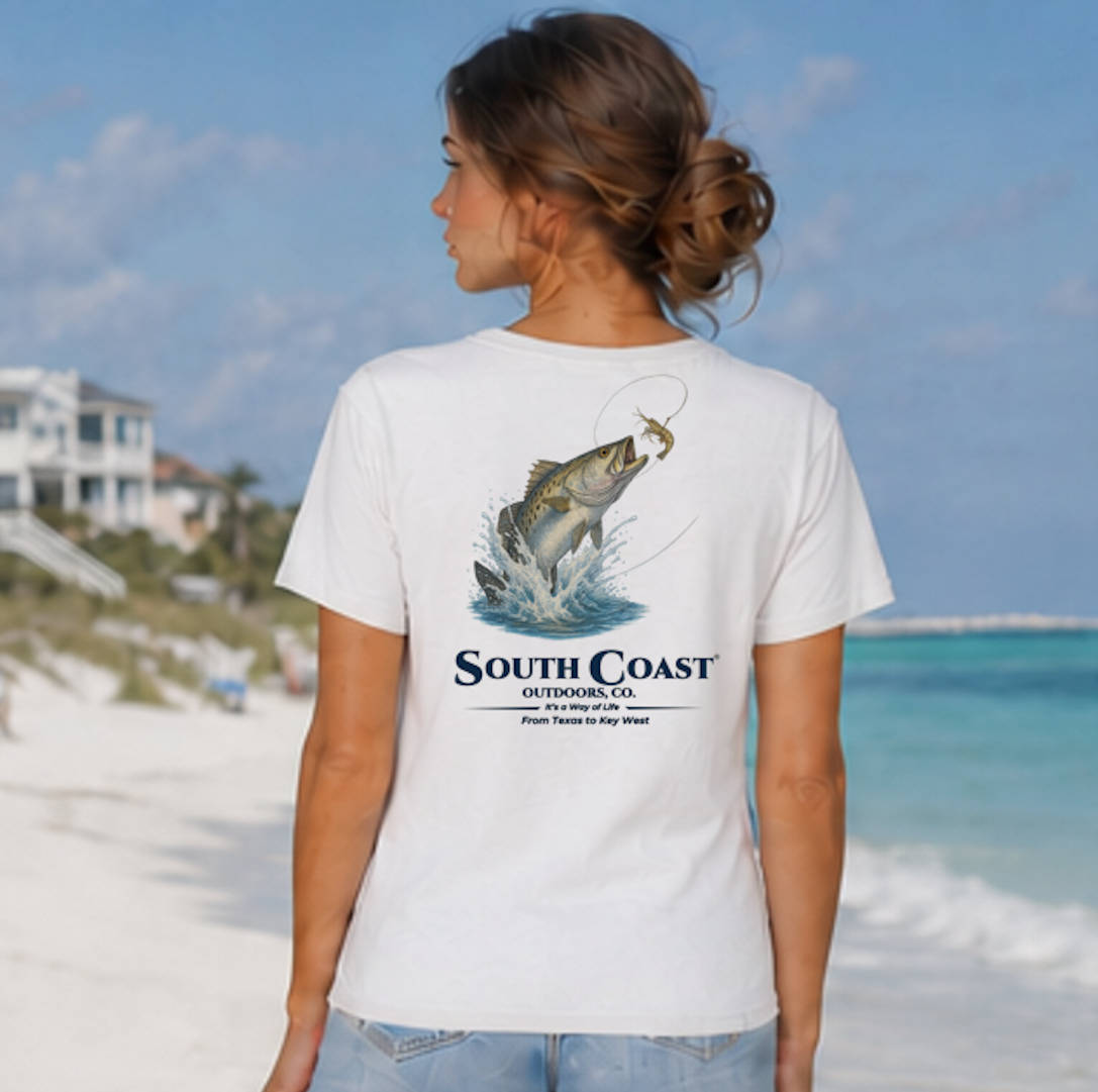 White back graphic fishing t-shirt with sea trout jumping and “South Coast” logo