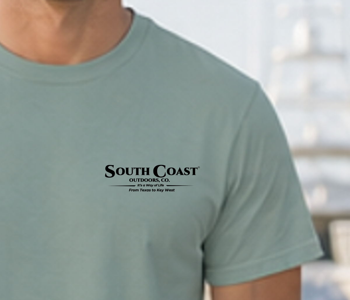 Mint green T-shirt with small chest logo emblem printed in black