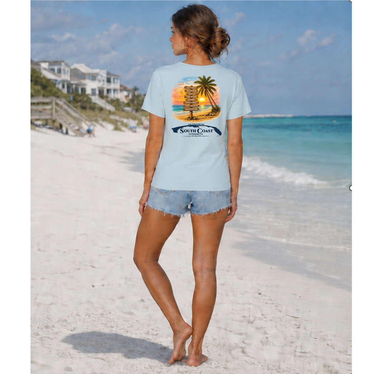 Light blue T-shirt with back beach sunset palm and route list graphic