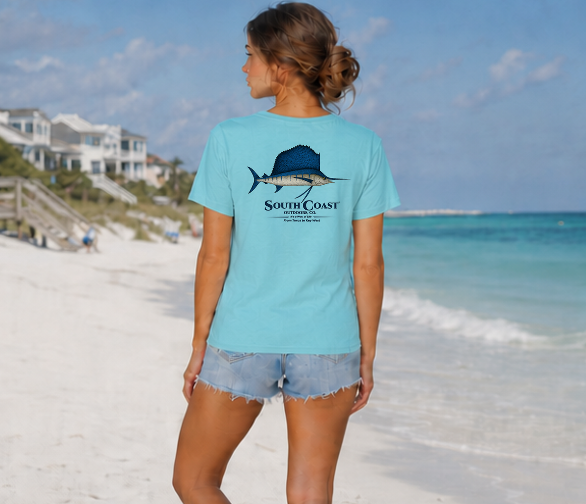 Light teal T-shirt with back sailfish graphic and South Coast Outdoor Co. logo