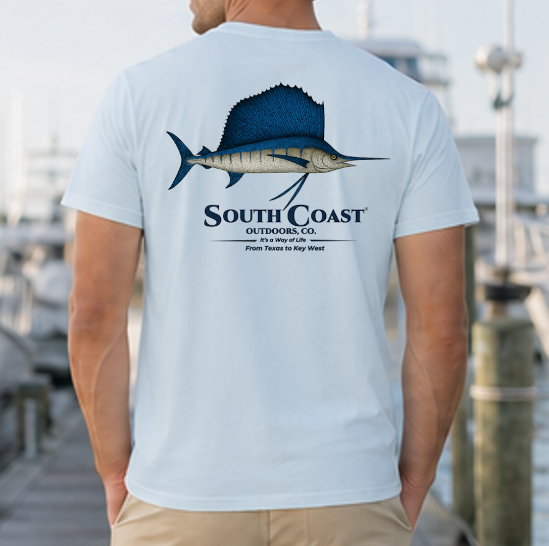 Light blue fishing T-shirt with back sailfish graphic and 'South Coast' logo