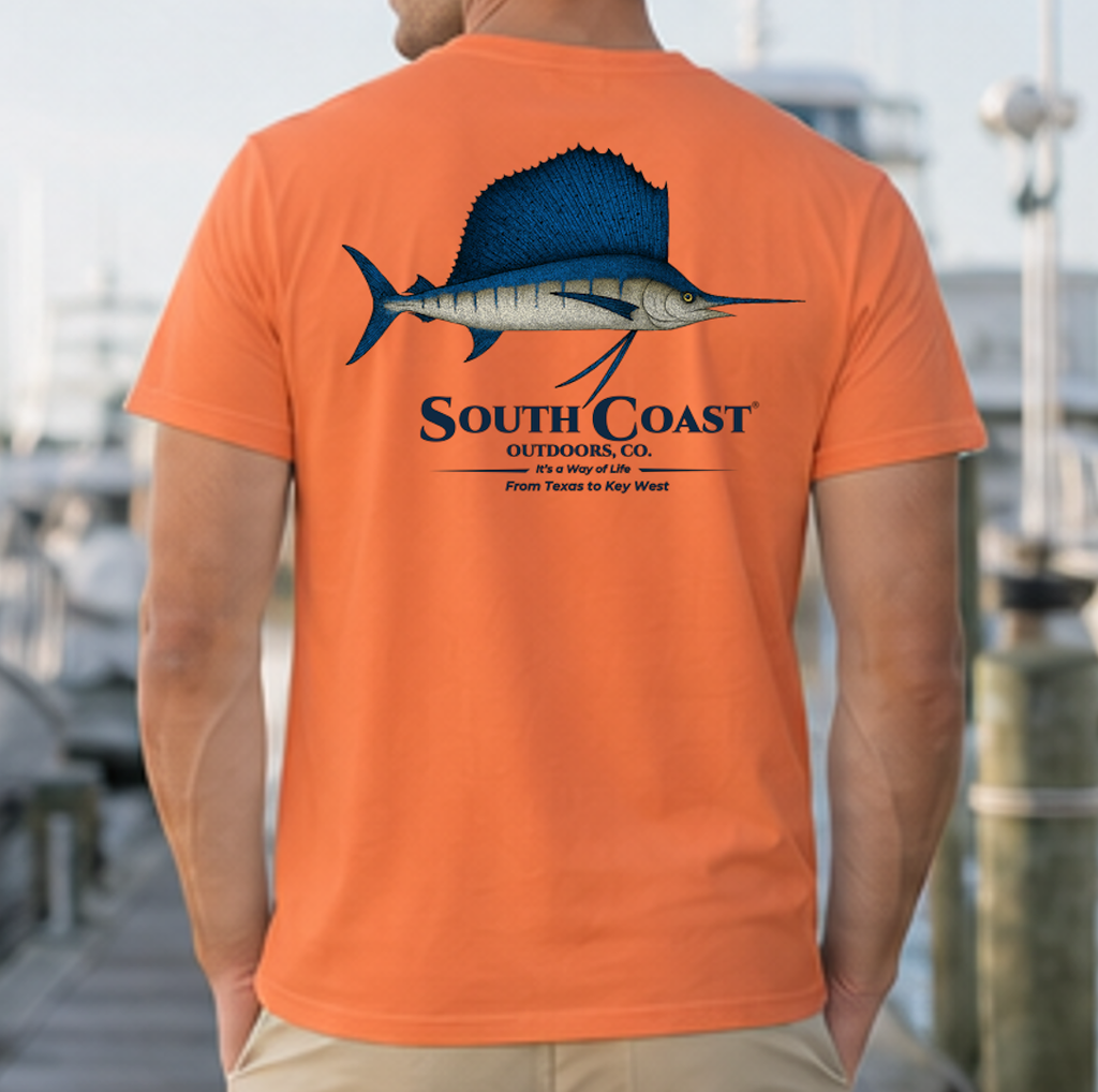 Burnt orange fishing T-shirt with back sailfish graphic and 'South Coast' logo
