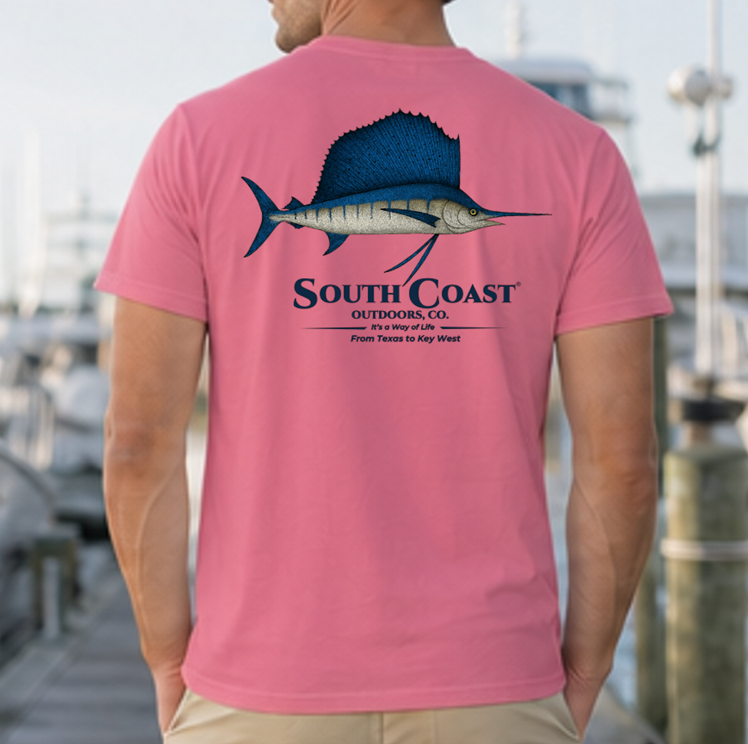 Pink fishing T-shirt with back sailfish graphic and 'South Coast' logo