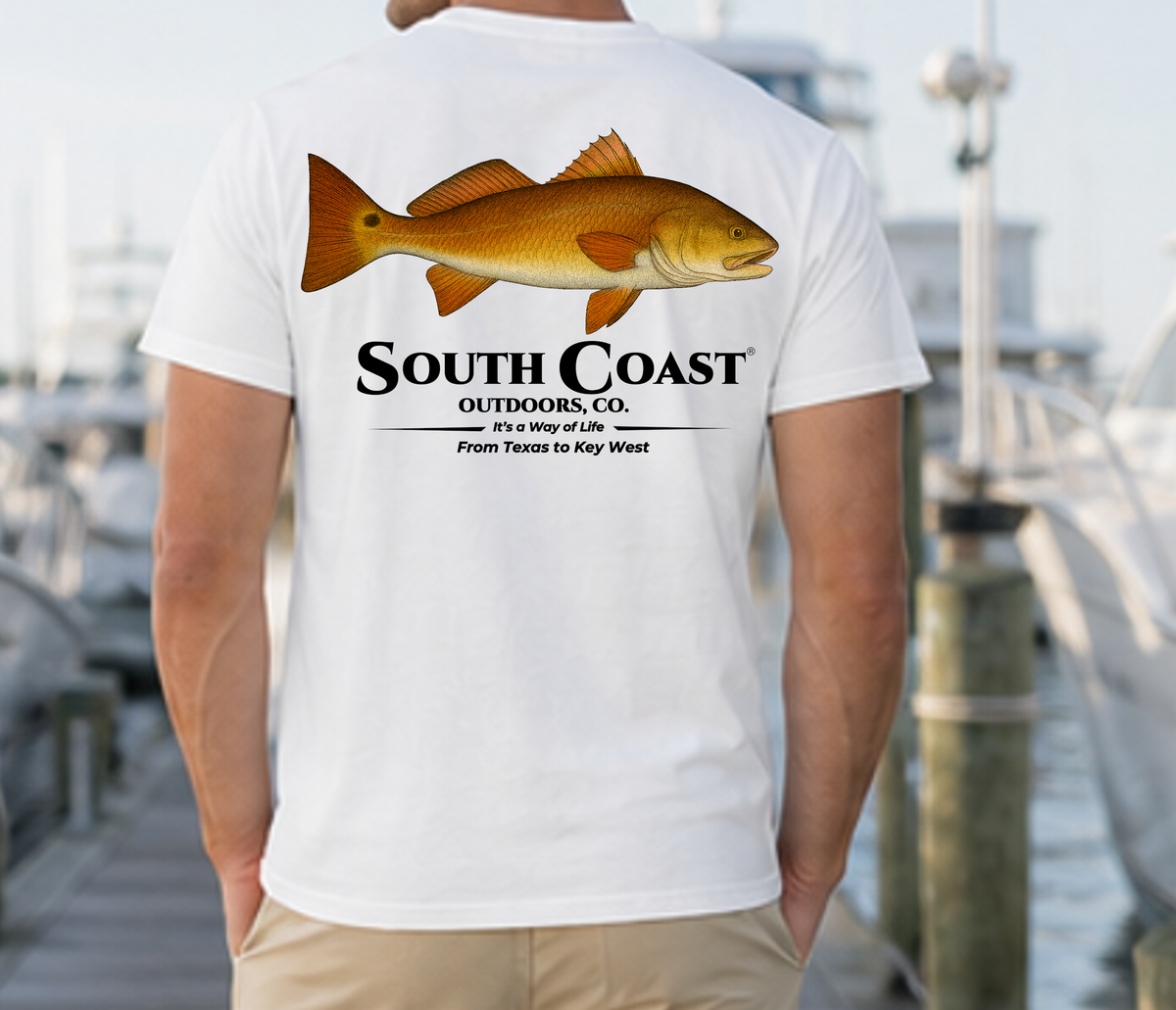 White T-shirt with large fish graphic and "South Coast" logo on back