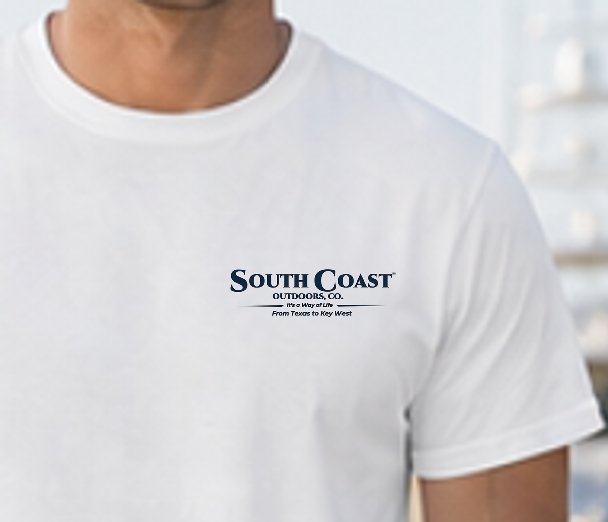 White T-shirt with "South Coast" logo text on chest