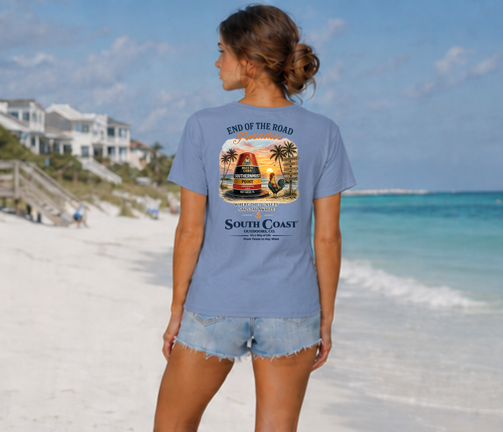 Light blue T-shirt with back illustrated tropical travel graphic