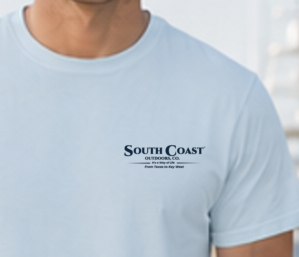Light blue graphic T-shirt front chest logo text South Coast Outdoors Co.
