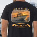 Black T-shirt with back fishing boat sunset graphic and text