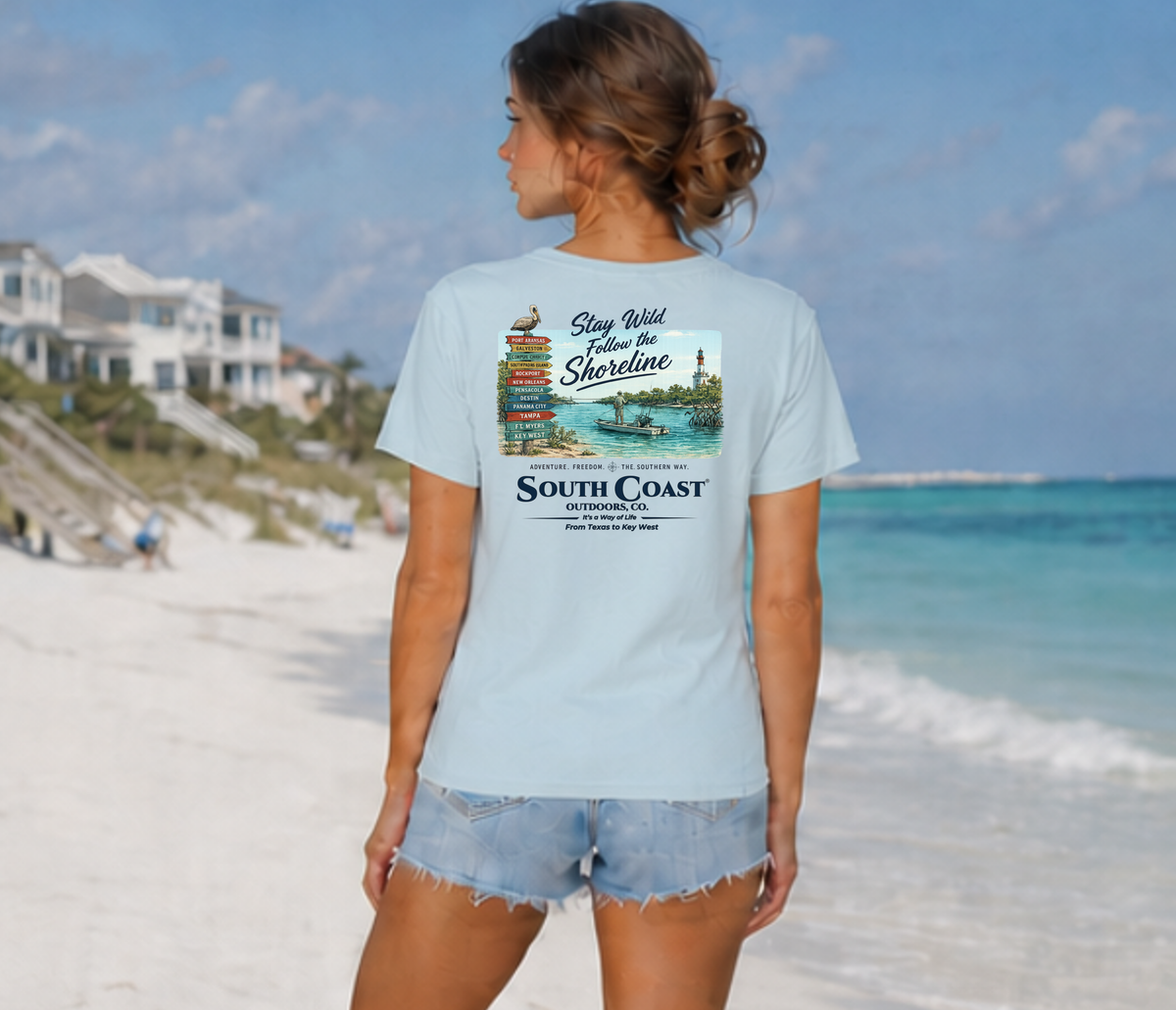 Light blue T-shirt, back view, with shoreline travel graphic