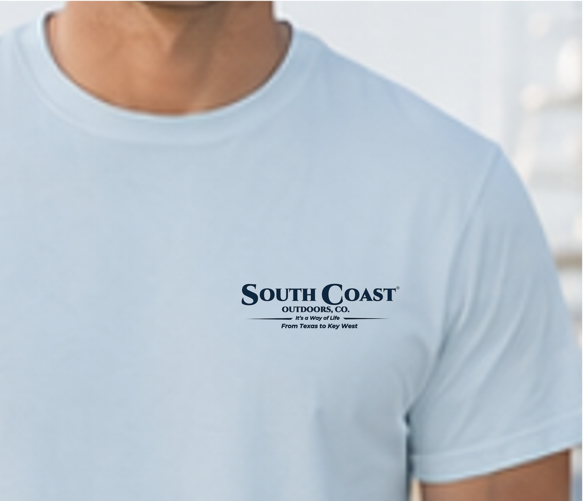Light blue T-shirt front with South Coast Outdoors Co. logo