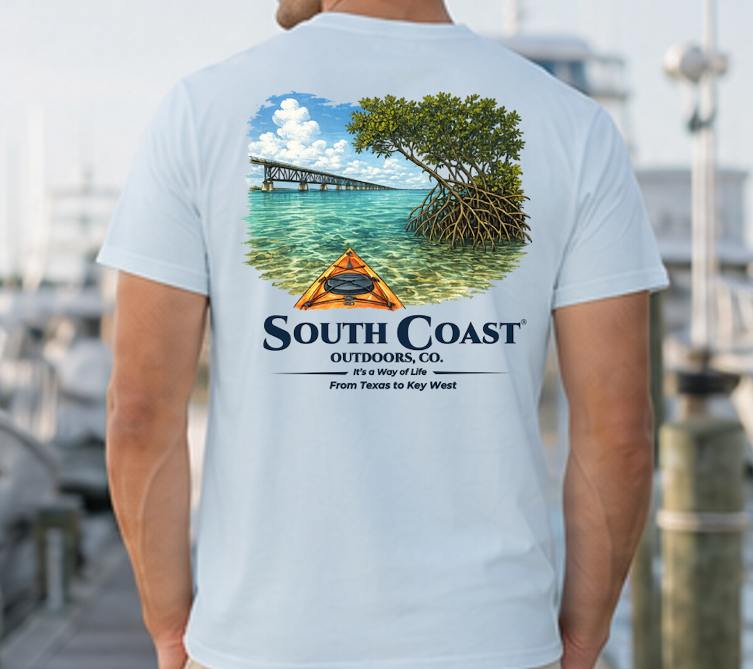 Men's light blue t-shirt, back graphic of mangrove island and orange kayak shelter