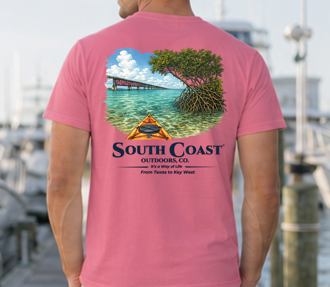 Men's magenta t-shirt, back graphic of mangrove island and orange kayak shelter
