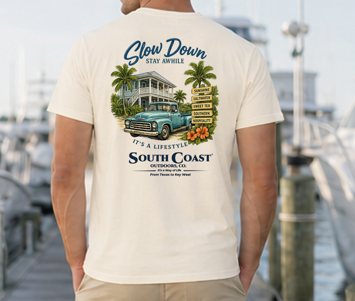 Ivory graphic T-shirt with 'Slow Down' beach house and truck back print