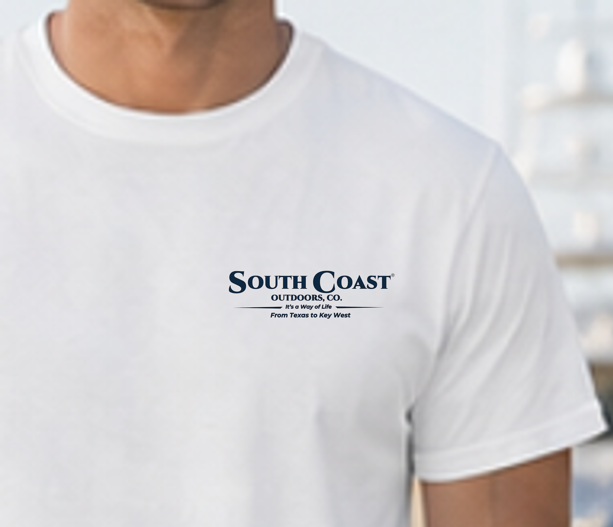 White crewneck T-shirt with small “South Coast” logo centered on the chest