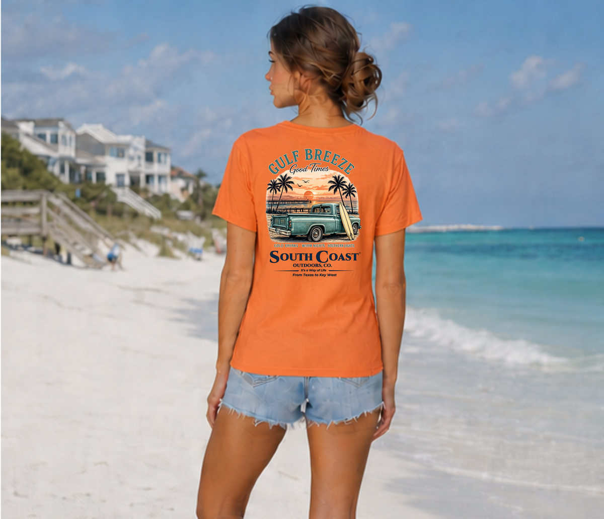 Orange Gulf Breeze T-shirt with large back graphic: truck, palm trees, “South Coast”