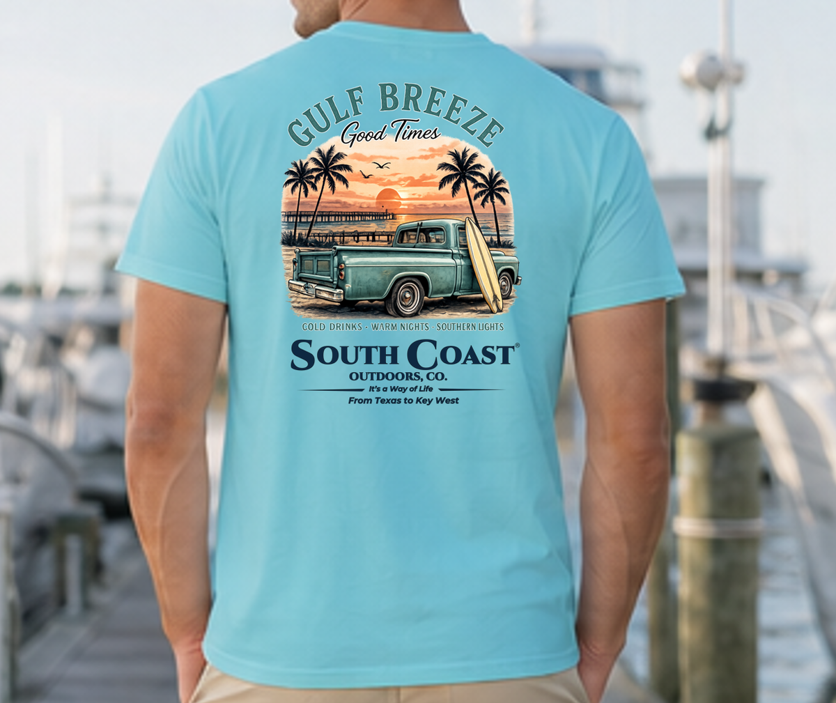 Turquoise coastal graphic t-shirt, back print of truck with palm trees and sunset
