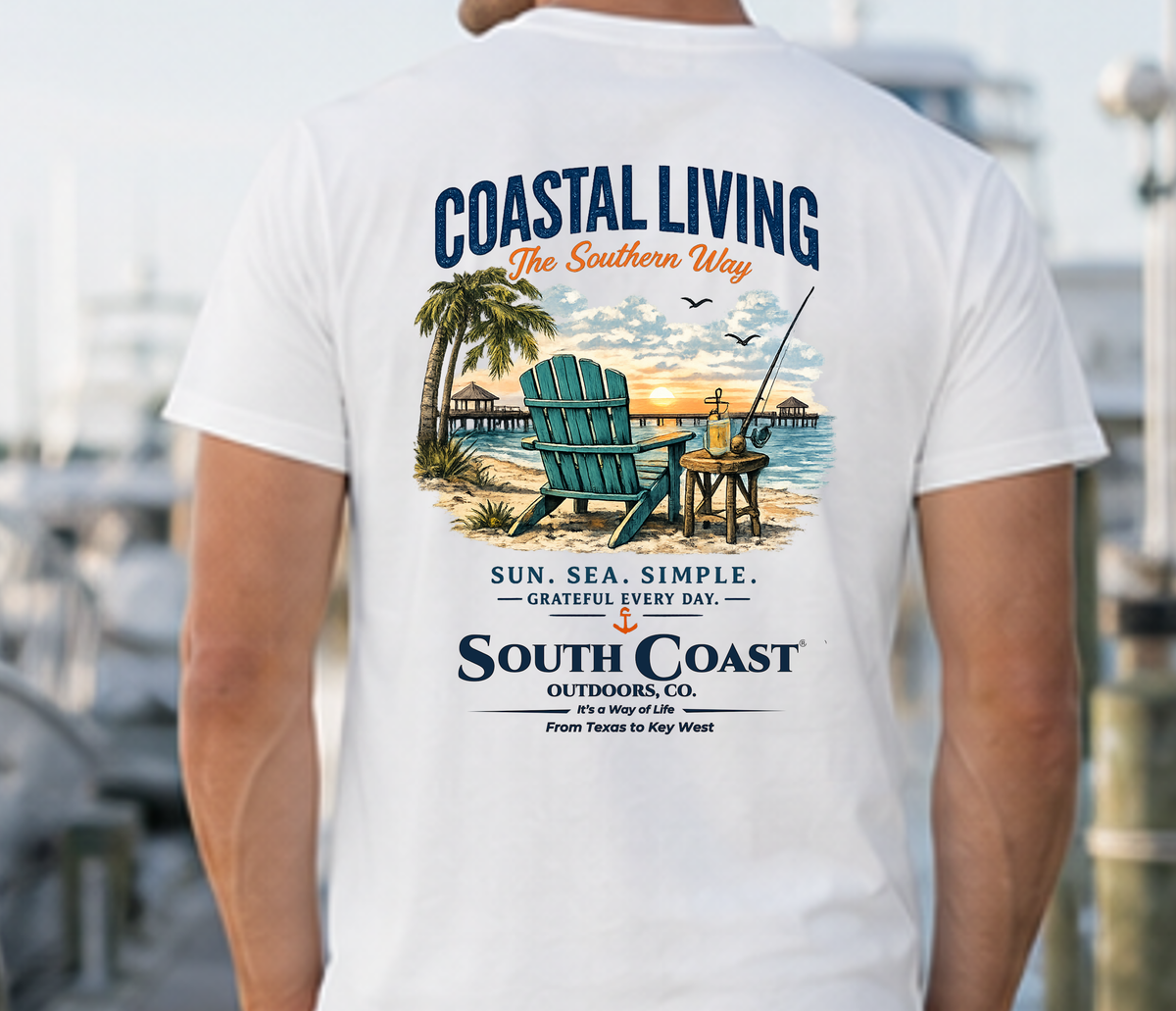 White graphic T-shirt with beach chair illustration and blue text on the back