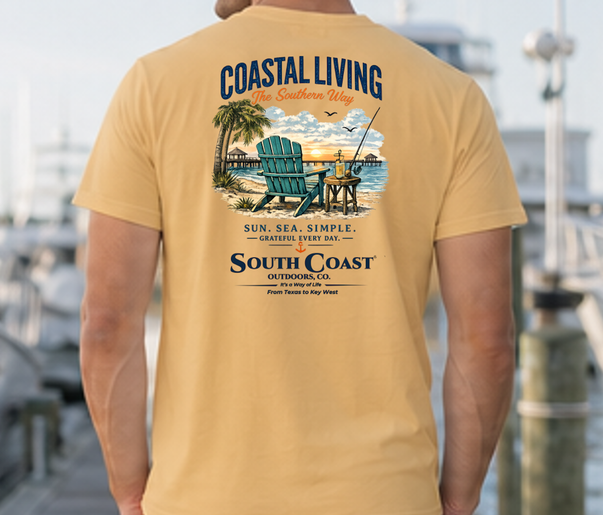 Mustard Coastal Living T-shirt with large back coastal scene graphic and text