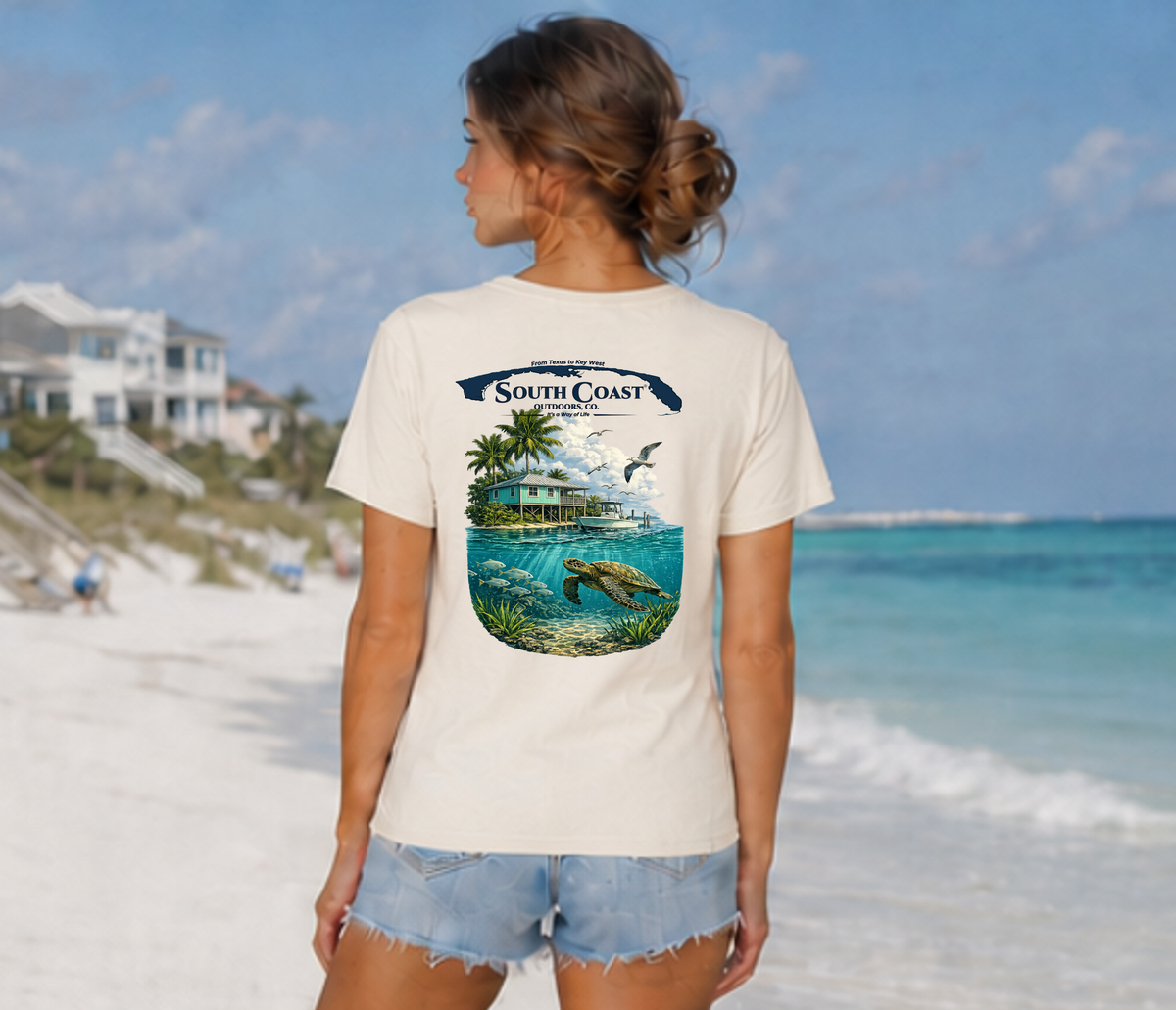Ivory short-sleeve T-shirt with back South Coast logo and tropical ocean graphic