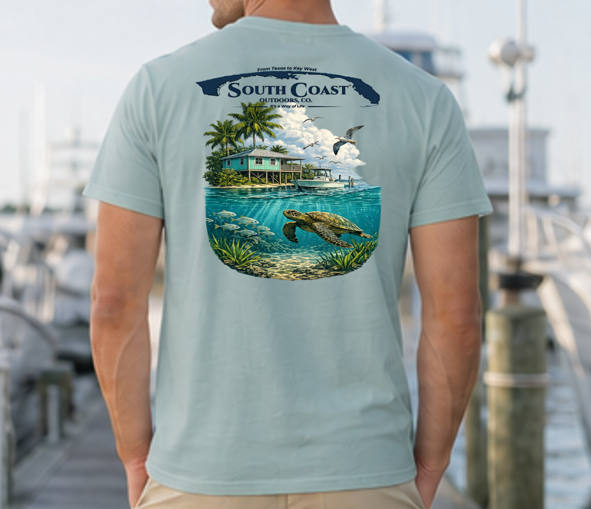 Men's teal T-shirt with back tropical island graphic, sea turtle, palm trees and logo
