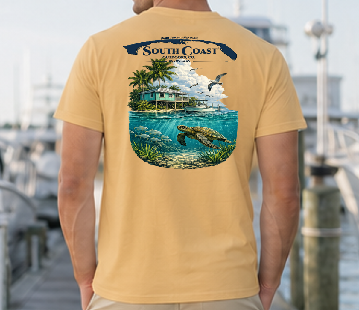 Men's mustard T-shirt with back tropical island graphic, sea turtle, palm trees and logo