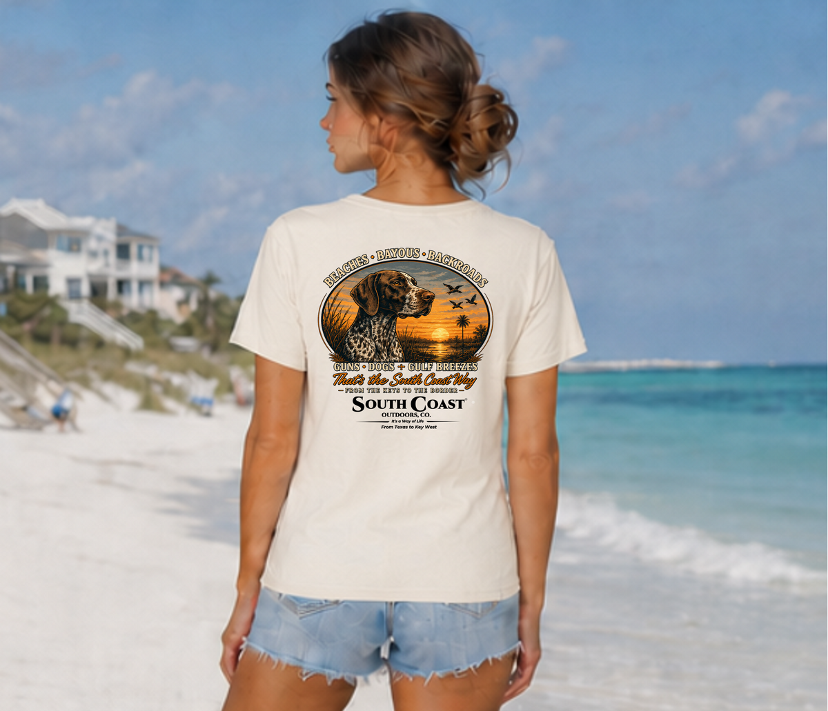White graphic T-shirt with circular dog-and-sunset print centered on back