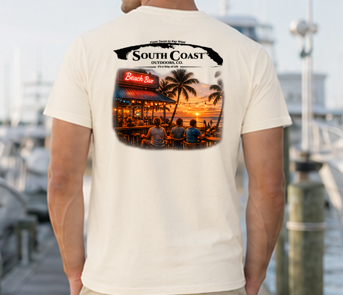 Men's ivory graphic T-shirt, back print with coastal bar logo and sunset photo