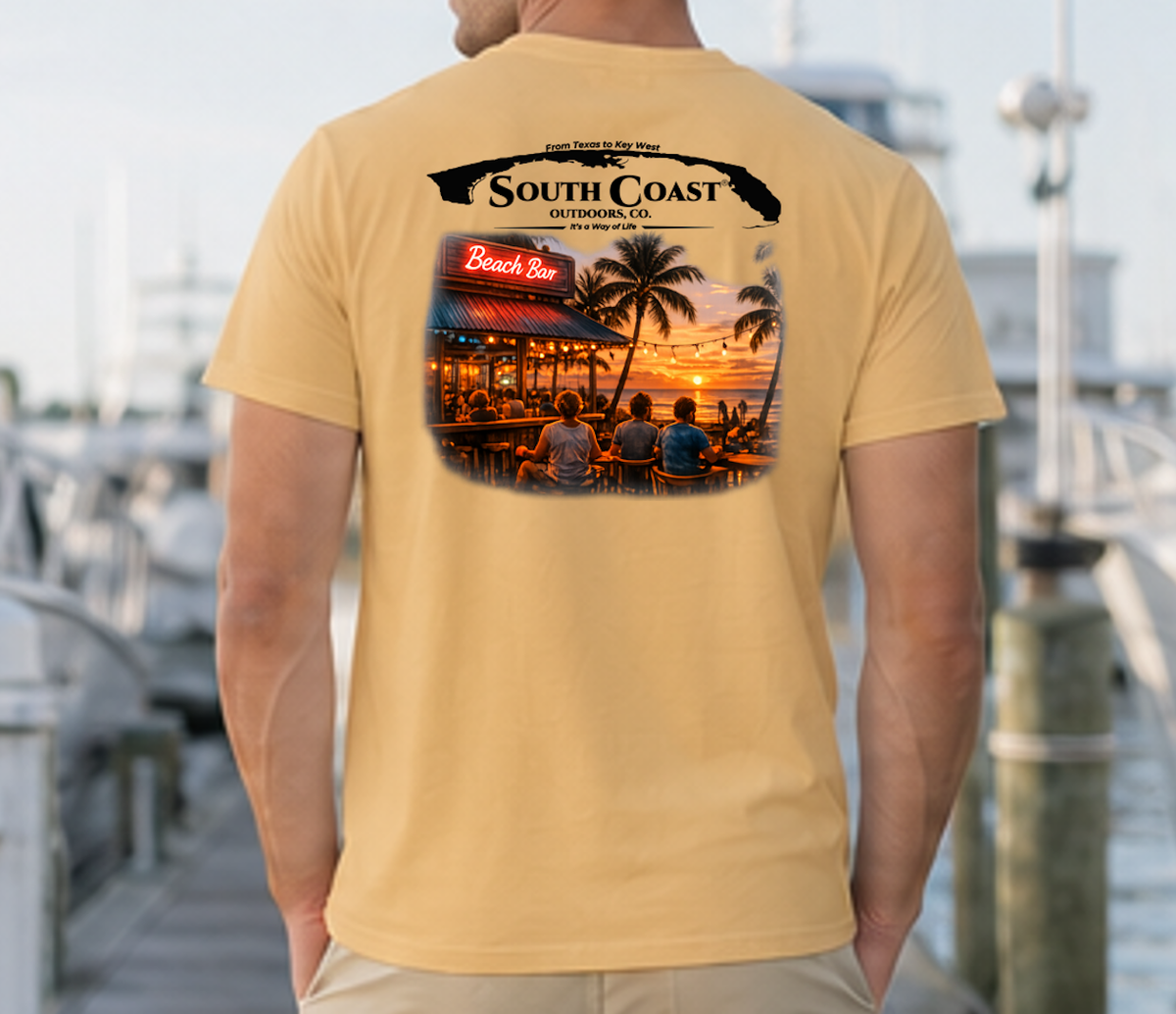 Men's yellow graphic T-shirt, back print with coastal bar logo and sunset photo