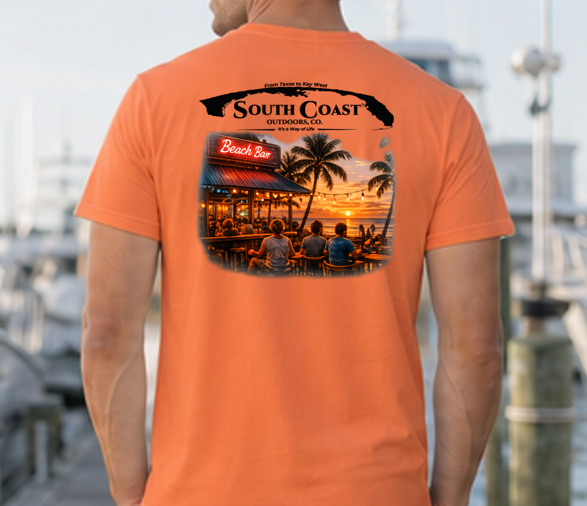 Men's burnt orange graphic T-shirt, back print with coastal bar logo and sunset photo