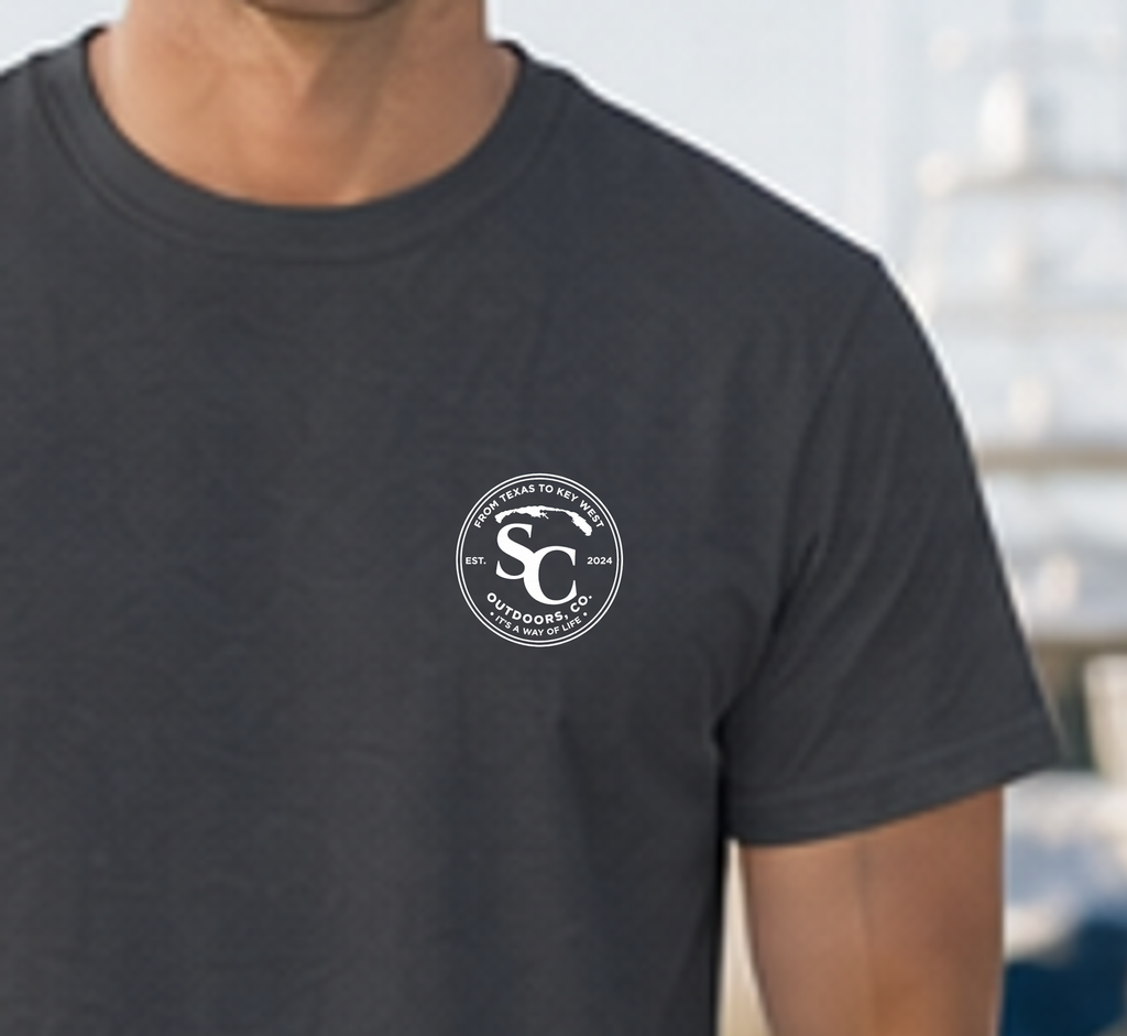 Black t-shirt with small circular front logo badge