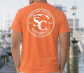 Burnt orange circle badge t-shirt with large back SC Outdoors logo