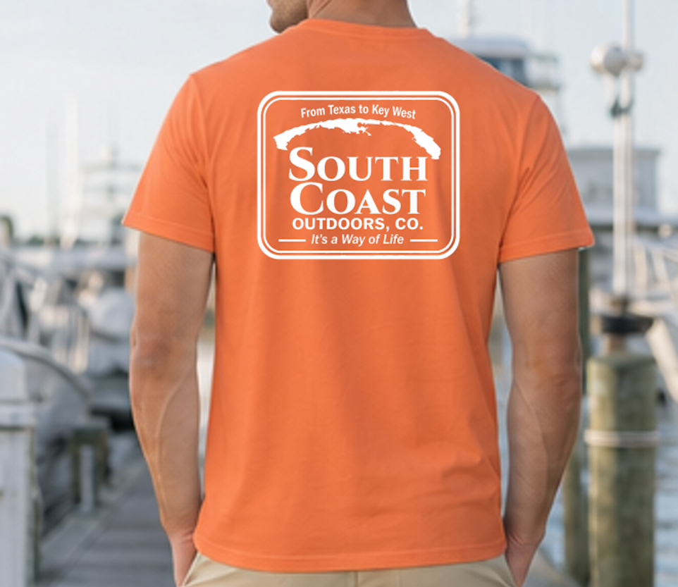 Orange T-shirt with large rectangular South Coast Outdoors logo on the back