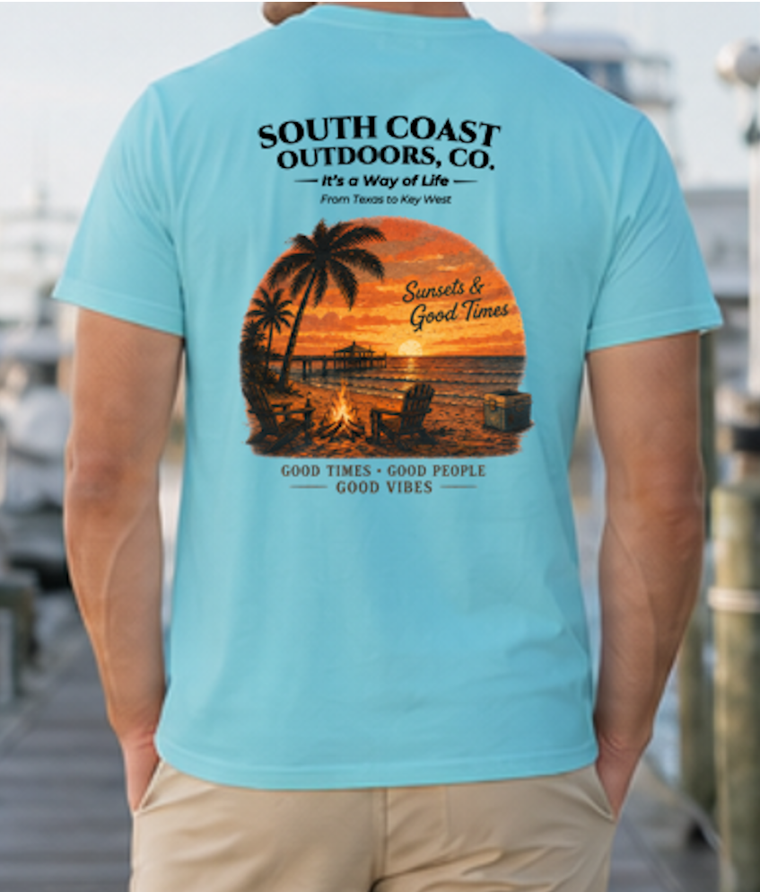 Turquoise T-shirt with back graphic of palm trees and sunset campfire scene