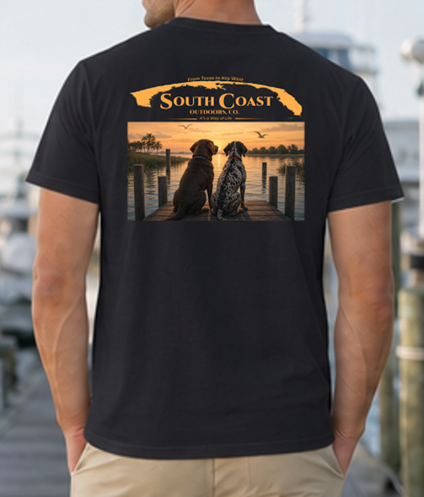 Black T-shirt with back graphic of two dogs on dock at sunset.