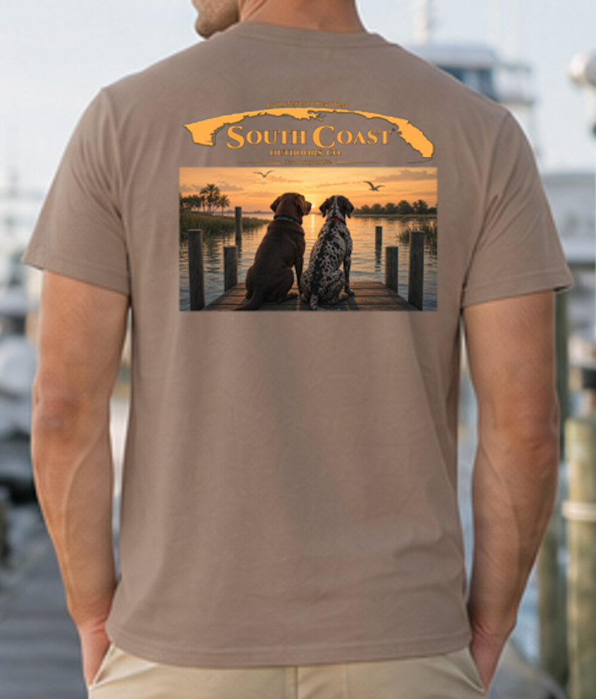 Tan T-shirt with two-dog sunset dock graphic on back