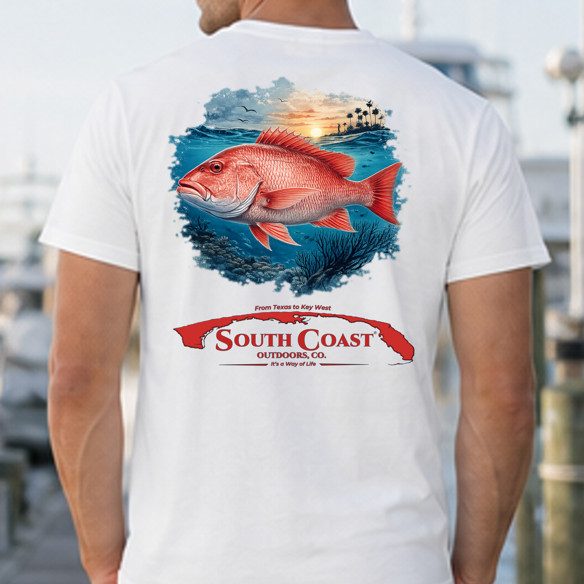 White T-shirt, back view, red snapper sunset graphic with South Coast Outdoors logo